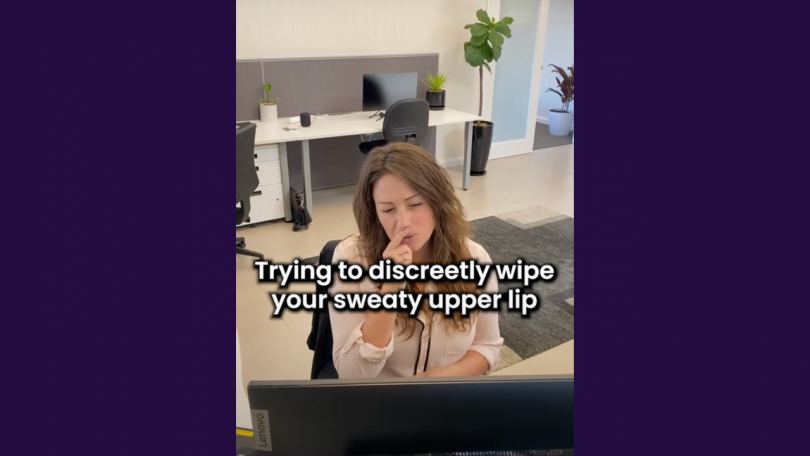 Businesswoman Wiping Sweaty Upper Lip